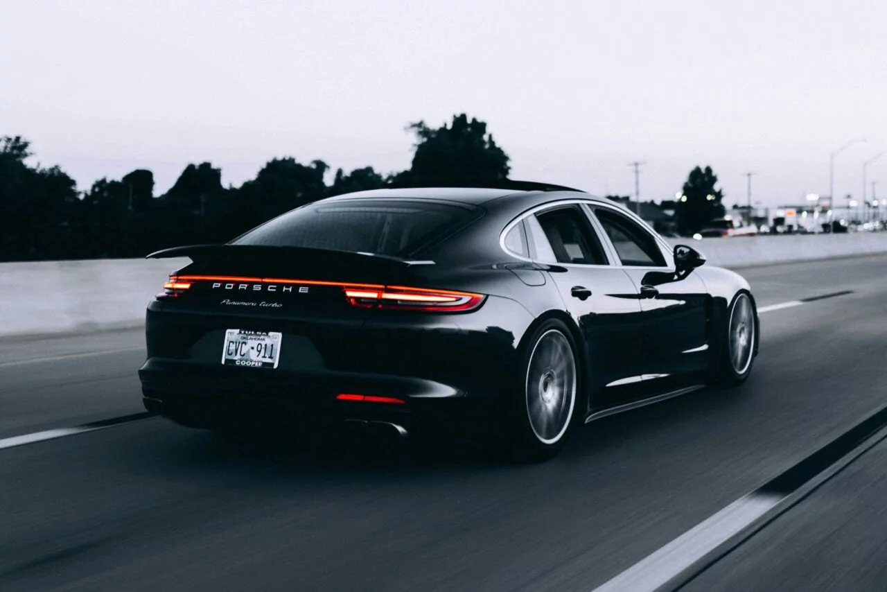 shiny black porsche mobile car detailing service
